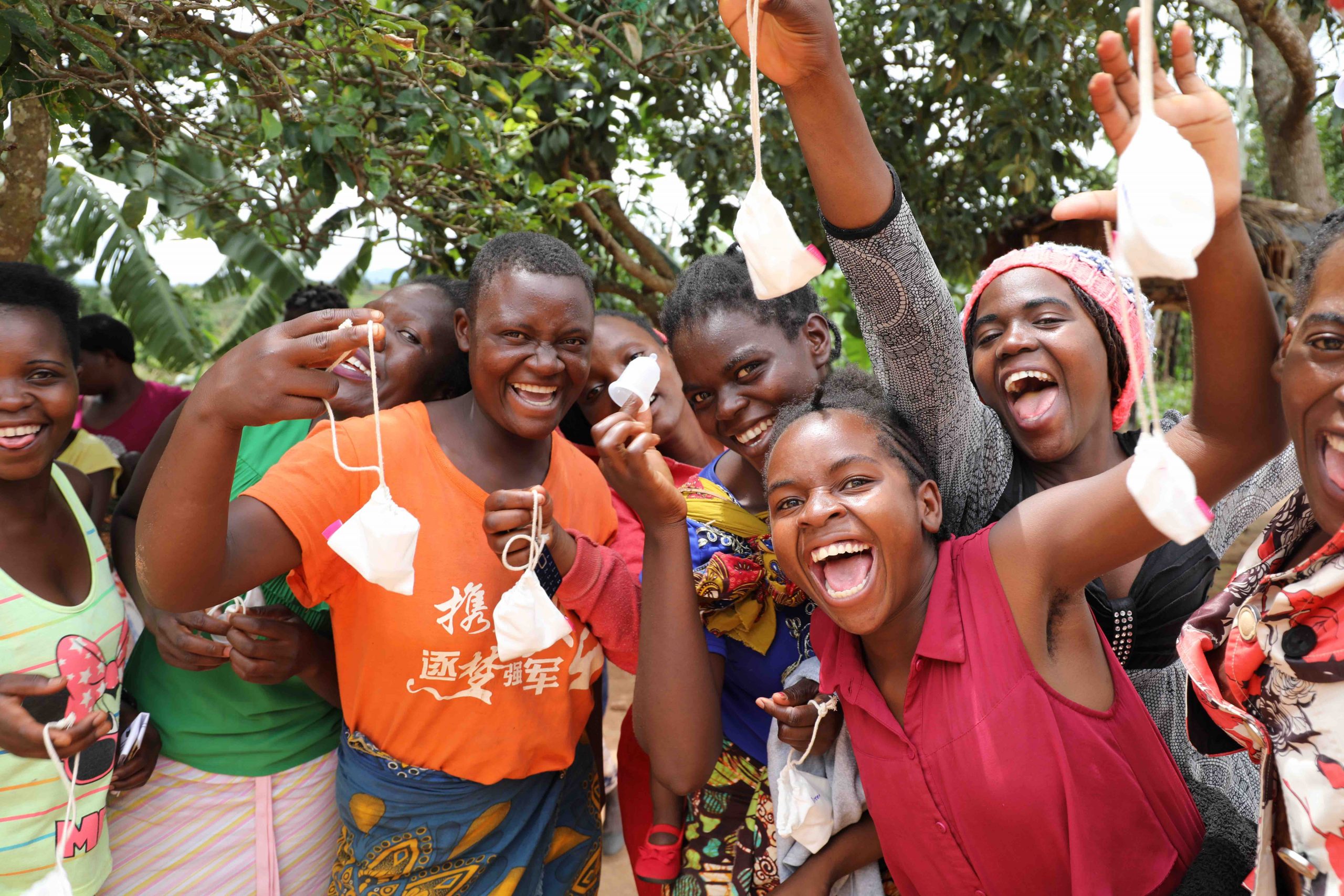 Girls receiving menstrual cups and The Cova Project’s menstrual health education 2